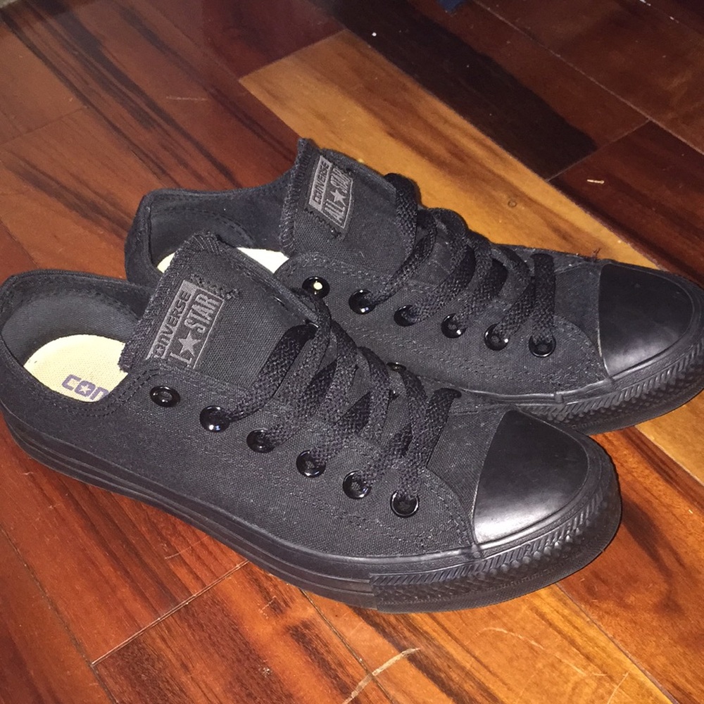All black low top Converse